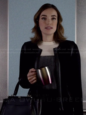Jemma’s black and white colorblock sweater and black handbag on Agents of SHIELD
