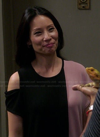 Joan’s pink and black colorblock shoulder cutout dress on Elementary