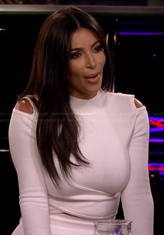 Kim Kardashian’s white cutout cropped sweater and skirt on 2 Broke Girls