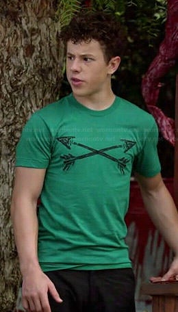 Luke’s green crossed arrows tee on Modern Family