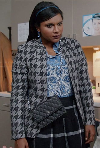 Mindy’s grey houndstooth jacket, blue printed shirt and checked skirt on The Mindy Project