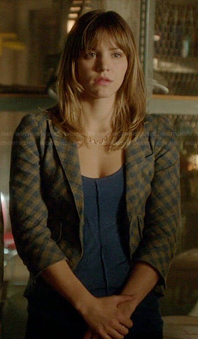 Paige’s checked blazer with leather elbow patches on Scorpion