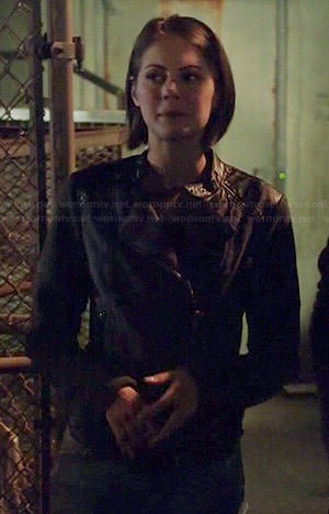 Thea’s mixed color jacket with leather shoulders on Arrow