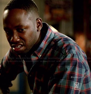 Winston’s blue and red plaid shirt on New Girl