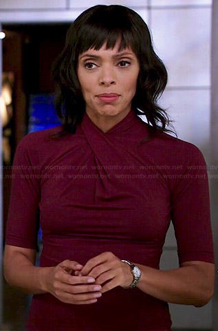 Camille’s burgundy cross neck top on Bones