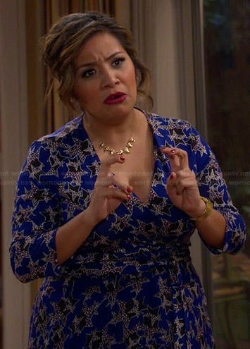 Cristela’s blue star print wrap dress on Cristela
