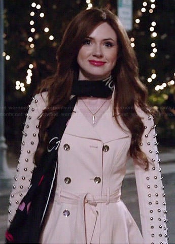 Eliza’s trench coat with studded sleeves on Selfie