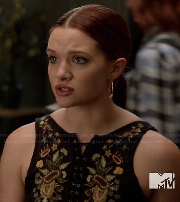 Karma’s black embroidered lace-up dress on Faking It