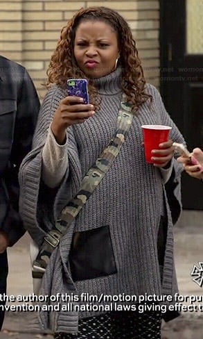 Kay’s grey turtleneck sweater with leather pockets on Marry Me
