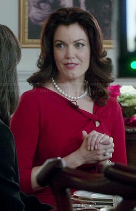 Mellie’s red knotted neck dress on Scandal