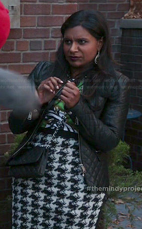 Mindy’s green floral top, houndstooth skirt and quilted leather jacket on The Mindy Project