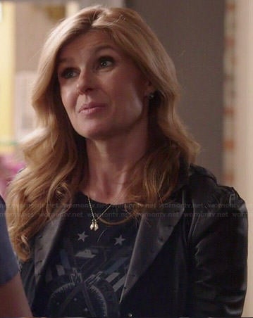 Rayna’s black star graphic tee and leather jacket on Nashville