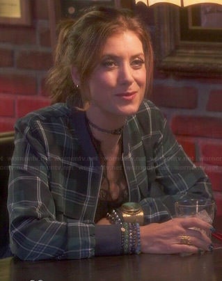 Rebecca’s green plaid bomber jacket on Bad Judge