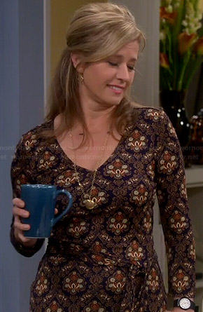 Vanessa’s navy and gold printed long sleeve dress on Last Man Standing