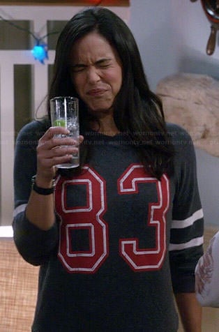 Amy’s grey ’83’ sweatshirt on Brooklyn Nine-Nine