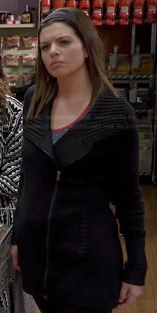 Annie’s black ribbed collar jacket on Marry Me