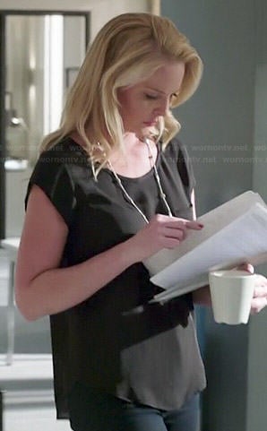 Charlie’s black short sleeve top on State of Affairs