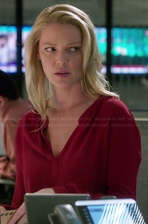 Charlie’s red long sleeved blouse on State of Affairs