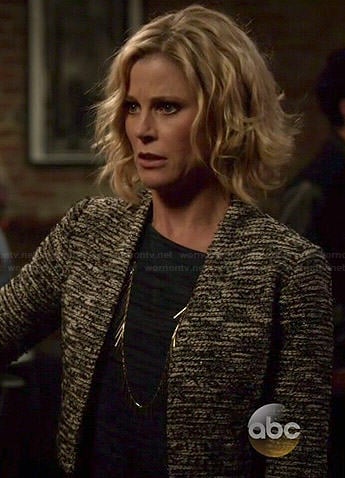 Claire’s blue striped top and cropped tweed jacket on Modern Family