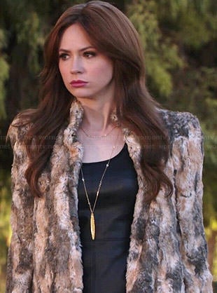 Eliza’s black leather top and fur jacket on Selfie
