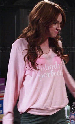 Eliza’s pink Nobody’s Perfect sweatshirt on Selfie
