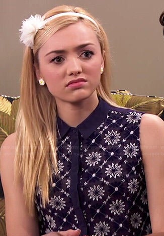 Emma’s navy blue floral sleeveless collared top on Jessie
