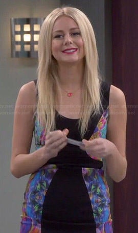 Maddie’s black multi-colored panel dress on Cristela