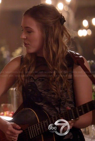 Maddie’s black scalloped lace dress on Nashville
