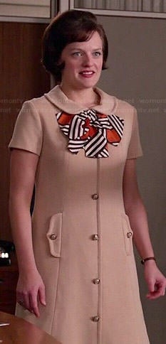Peggy’s beige button-front dress with striped bow on Mad Men