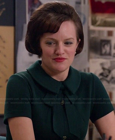Peggy’s green button front dress with tie neck on Mad Men