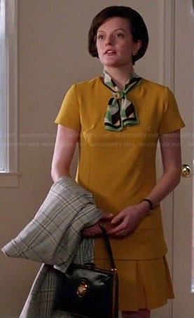 Peggy’s yellow top and pleated skirt set on Mad Men