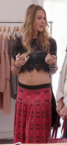 Phoebe’s black lace crop top and red maxi skirt on Girlfriends Guide to Divorce
