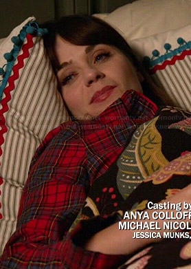 Jess’s red plaid pajamas on New Girl