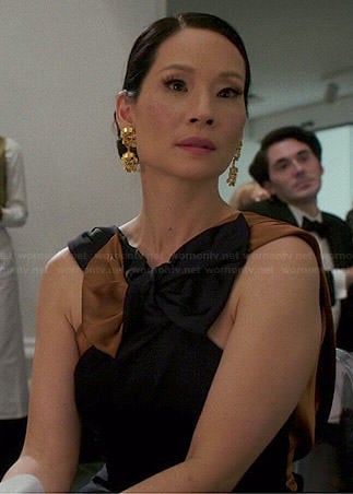 Joan’s navy and tan/gold bow gown on Elementary