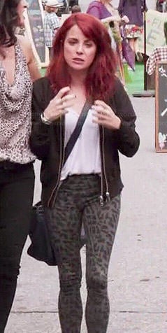 Jo’s grey leopard print leggings and black jacket on Girlfriends Guide to Divorce