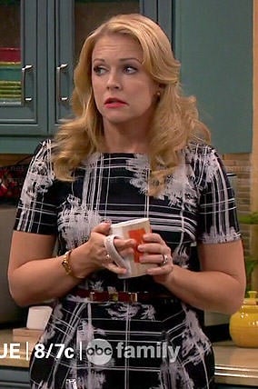 Mel’s black checked and floral print dress on Melissa and Joey