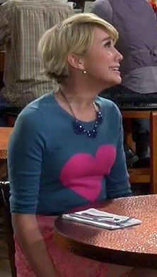 Riley’s heart sweater and pink lace skirt on Baby Daddy