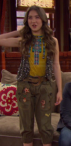 Riley’s yellow beaded top, studded vest and fringed ankle boots on Girl Meets World