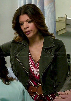 Xiomara’s printed v-neck maxi dress and black denim jacket on Jane the Virgin