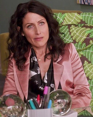 Abby’s black and white printed blouse and pink blazer on Girlfriends Guide to Divorce