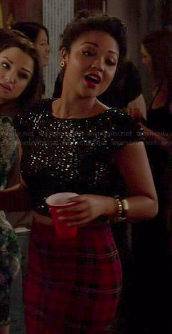 Beth’s red plaid skirt and black sequin crop top on Chasing Life