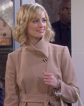 Caroline’s biege coat on 2 Broke Girls