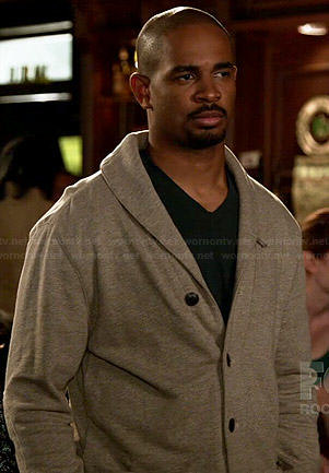 Coach’s grey shawl collar cardigan on New Girl