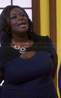 Donna’s blue leopard print dress on Parks and Recreation