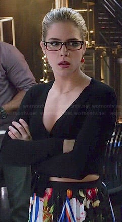 Felicity’s black long sleeved wrap top and floral pleated skirt on Arrow