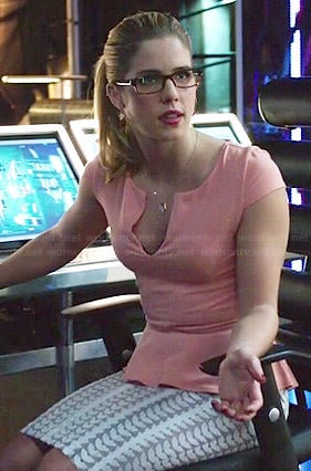Felicity’s coral peplum top and embellished skirt on Arrow