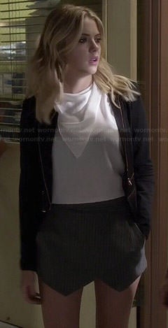 Hanna’s white layered top, black zipped blazer and grey skort on Pretty Little Liars