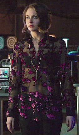 Thea’s black and pink sheer floral blouse on Arrow