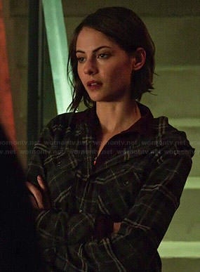 Thea’s plaid hooded shirt and black jacket on Arrow