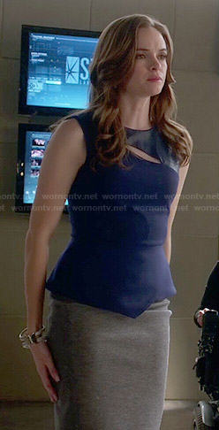 Caitlin’s blue leather panel peplum top on The Flash
